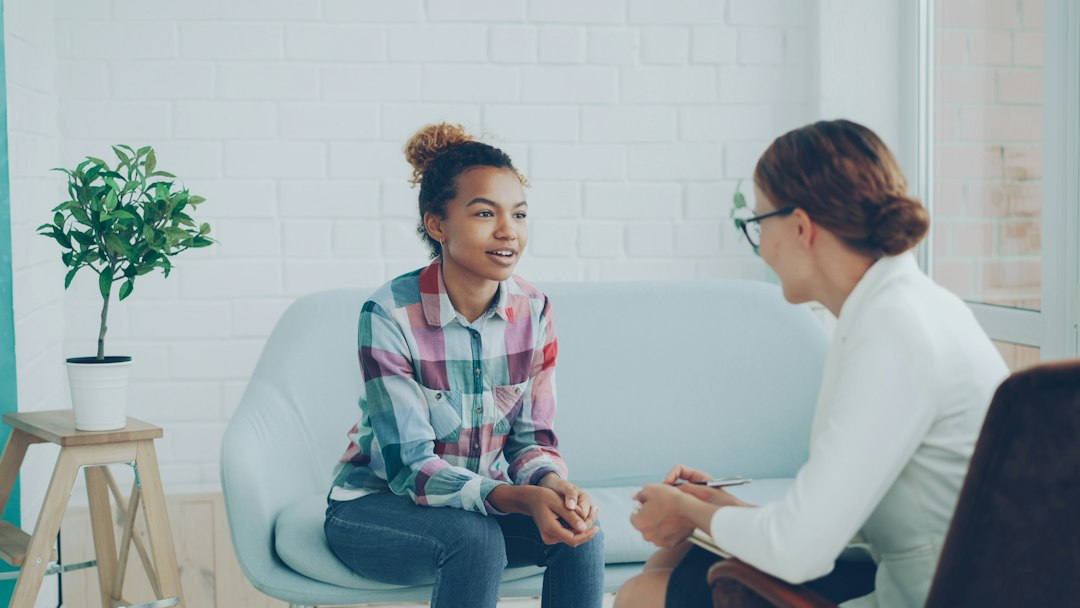 Therapist listening to a client during a counseling session